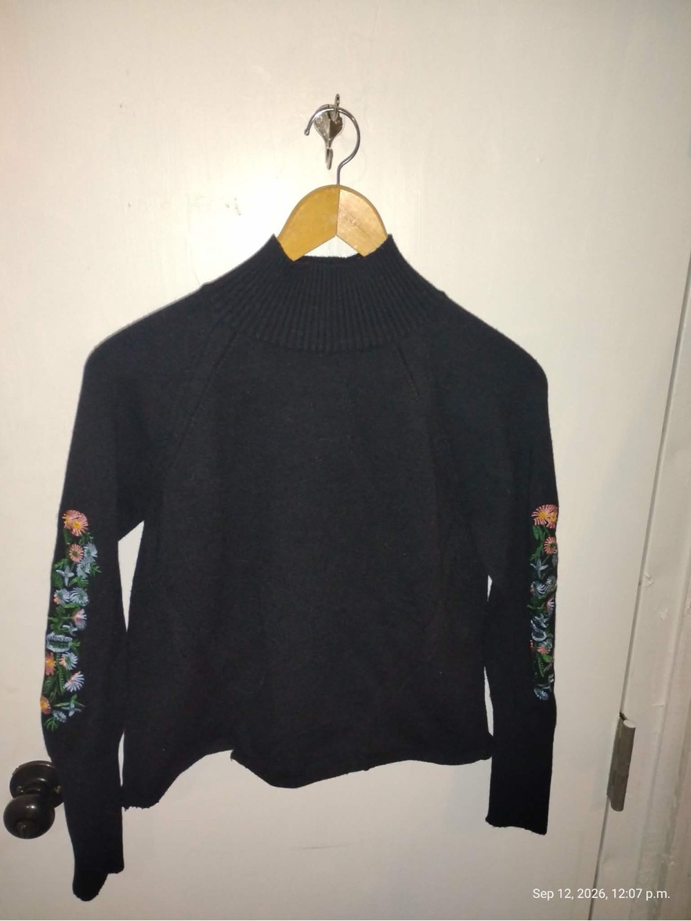 Black Mock Neck Sweater with Embroidered Floral Sleeves